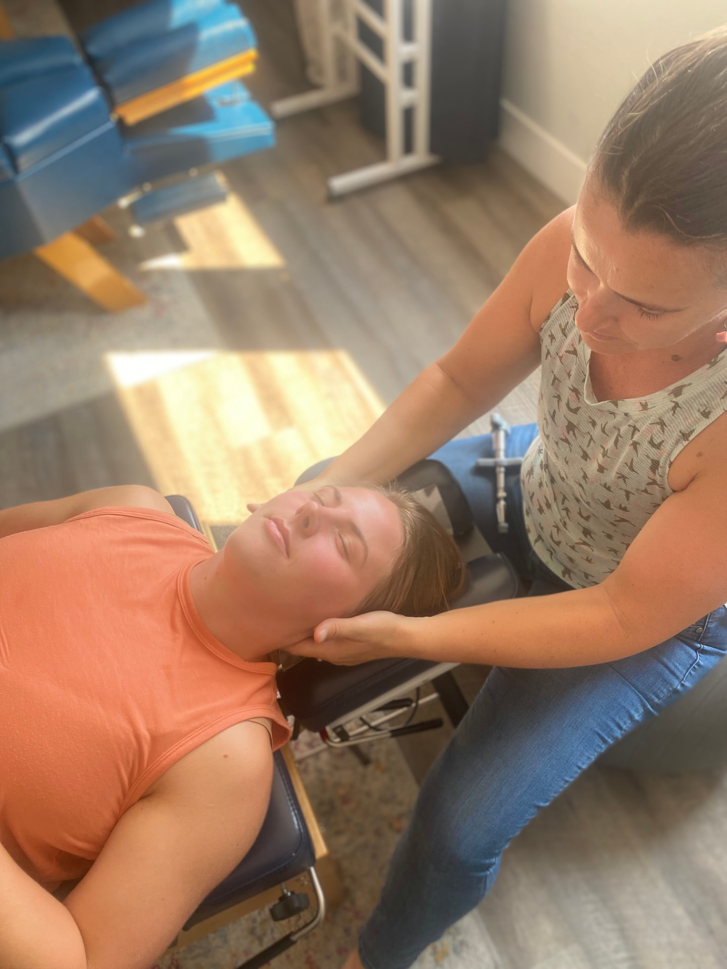 Dr. Liz performing a gentle chiropractic adjustment on a patient at Primal Practice in Missoula